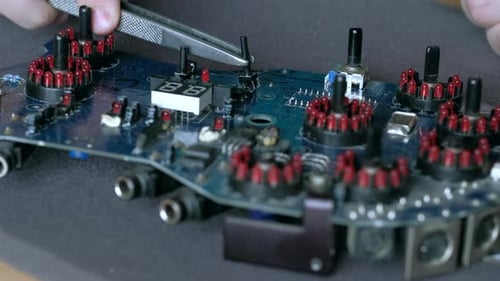 Assembling Electronic Components on Circuit Board with Tweezers