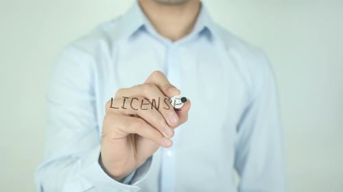 Writing Licensed on Clear Surface With Marker