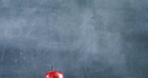 School Supplies Still Life with Apple and Books