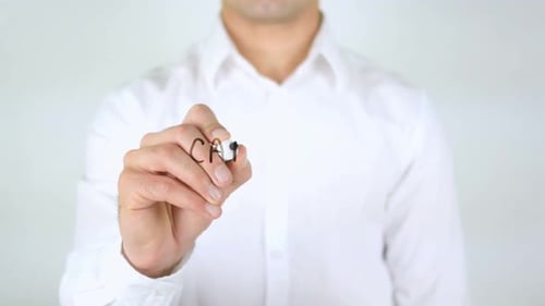 Man Writes Car Loan Approved on Transparent Surface