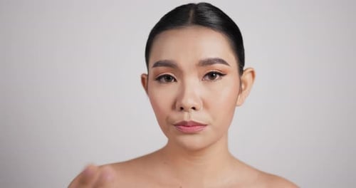 Close up of Beauty Asian woman face looking at camera
