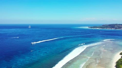 Tropical flying island view of a sandy white paradise beach and aqua turquoise water background in c