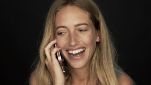 Smiling Woman Talking on Mobile Phone Close-Up