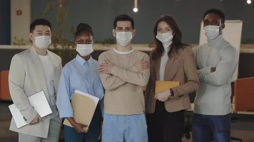 Portraits of Business Multicultural Group Standing at Office with Crossed Arms Wearing Medical Masks
