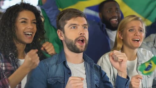 Brazilian Fans Cheering in Excitement and Celebration