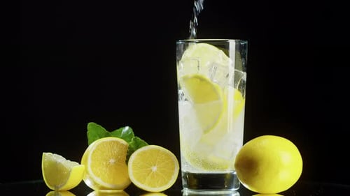 Sparkling Lemon Soda Being Poured Into Glass