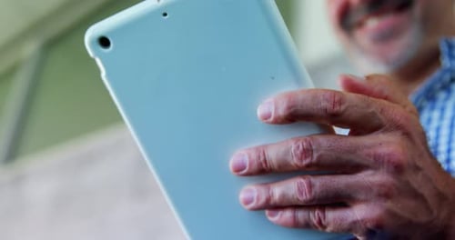 Executive using digital tablet in office 4k