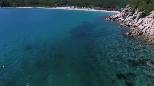 Aerial Shot of Mountain Cliff and Blue Sea Water