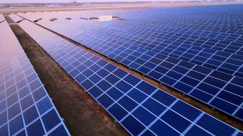 Closeup HDR Aerial View of Solar Panels Stand in a Row in the Fields Power Ecology Innovation Nature