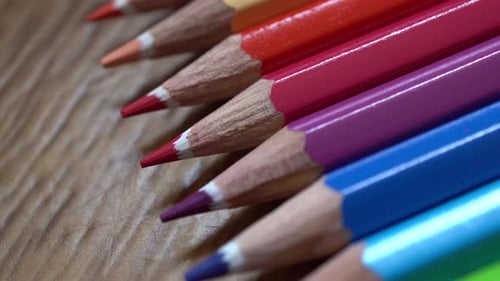 Color Pencils On The Brown Background