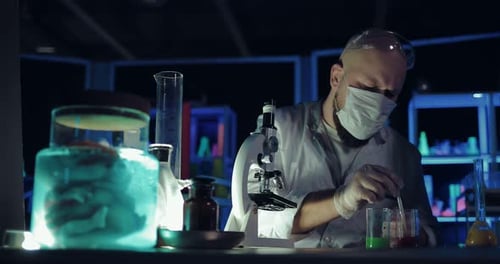 Scientists Conducting Research in Dark Futuristic Laboratory