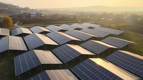 Aerial View of Large Sustainable Electrical Power Plant with Rows of Solar Photovoltaic Panels for