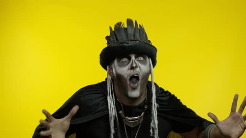Scary Character Gesturing Against a Yellow Background