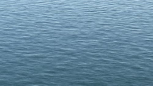 Beautiful Ocean Waves and Ripples in Blue Water