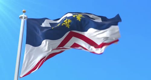 Realistic Acadian Flag Waving in Wind Against Blue Sky
