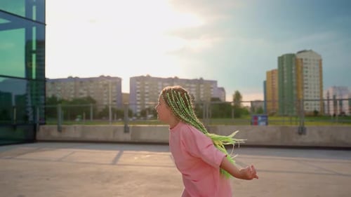 Girl dancing outdoors close up. Young female dancer person express emotions through body