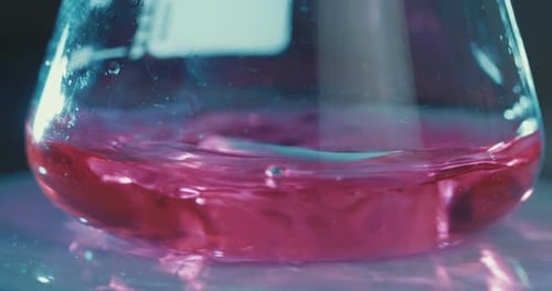 Slow motion of mixing chemicals inside a test tube
