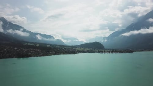 Breathtaking View From Above of a Swiss Lake Surrounded By Tall Mountains