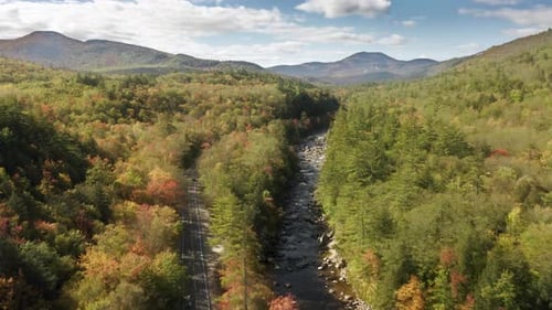 Aerial View of the Fall Natural Landscape with White Clouds Behind