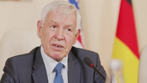 Adult Man Speaking at Press Conference Close Up