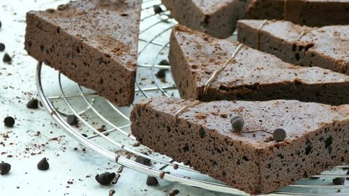 Decadent Chocolate Brownies on Cooling Rack with Chips