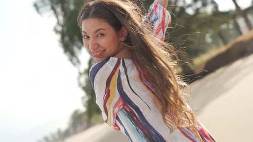 4K Portrait of Beautiful Caucasian woman walking on tropical beach in summer sunny day