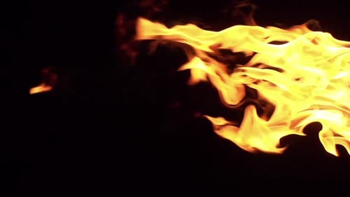 Abstract Flames Igniting Horizontally on Black Background