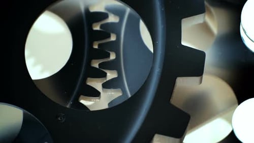 Mechanical Gears Turning in Studio Close Up