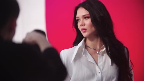 Fashionable Woman Posing in Bright Studio