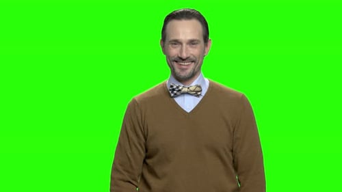 Man Shows Okay Sign on Green Screen