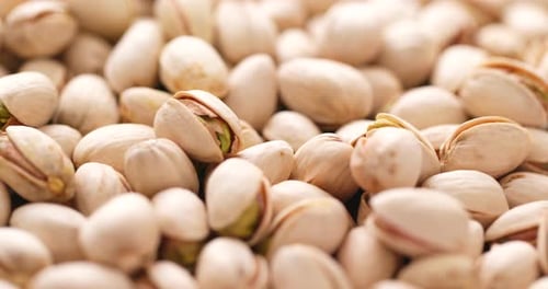 Pile of Pistachios Nuts in Shells Close Up