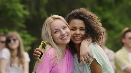 Beautiful Curly Biracial Girl Hugging Best Friend, Sincere Emotions, Friendship