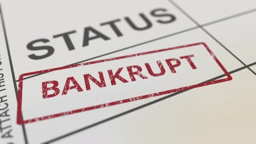 Mettre le tampon rouge « BANKRUPT » sur un formulaire papier