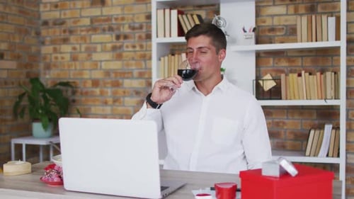 Man Celebrating Anniversary at Home With Wine