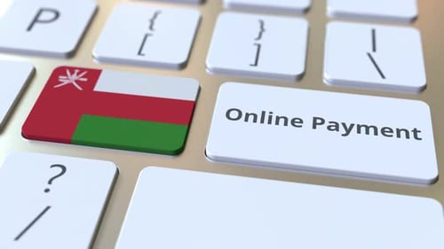 Online Payment Text and Flag of Oman on the Keyboard