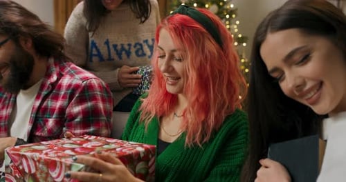 Friends Gathering for Christmas Holiday Gift Exchange