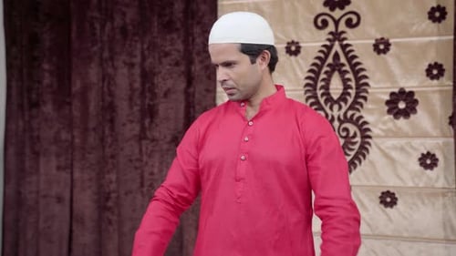 Man Reads Book Indoors