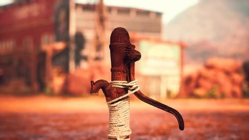 Old Rusted Water Pump in Wild West Town