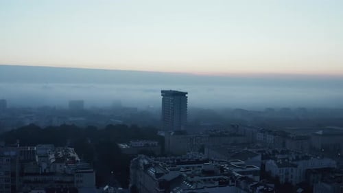 Misty Cityscape Aerial at Sunrise