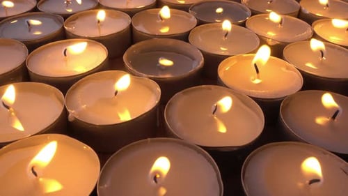 Many Tea Light Candles Flickering Warmly