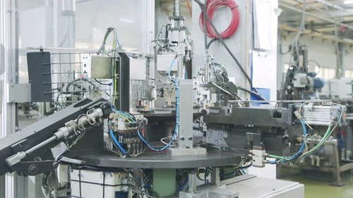 Automated assembly line for metal parts in the automotive industry
