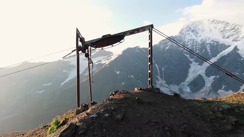 Drag Lift on Top of Mountain Against Snowcapped Peaks of Elbrus