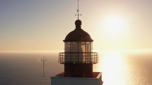 Lighthouse at Sunrise Along the Coastline