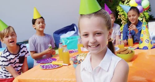 Smiling Children Celebrating at a Birthday Party