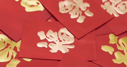 Close Up of Red Envelopes with Embossed Designs