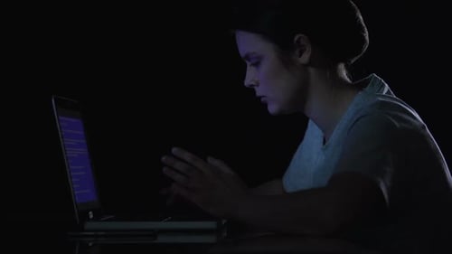 Woman Watching at Blue Screen of Death on Her Laptop and Calling to Master
