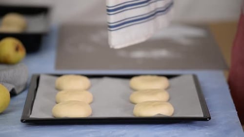 Dough Preparation with a Blue and White Towel