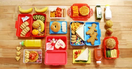 Various sweet foods and fruit in a box