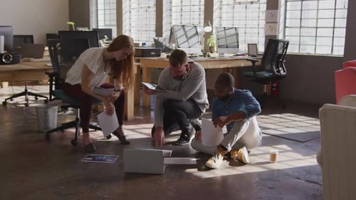 Young creative professionals working in a modern office