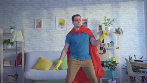 Super-héros Dancing Man Householder aux gants jaunes
